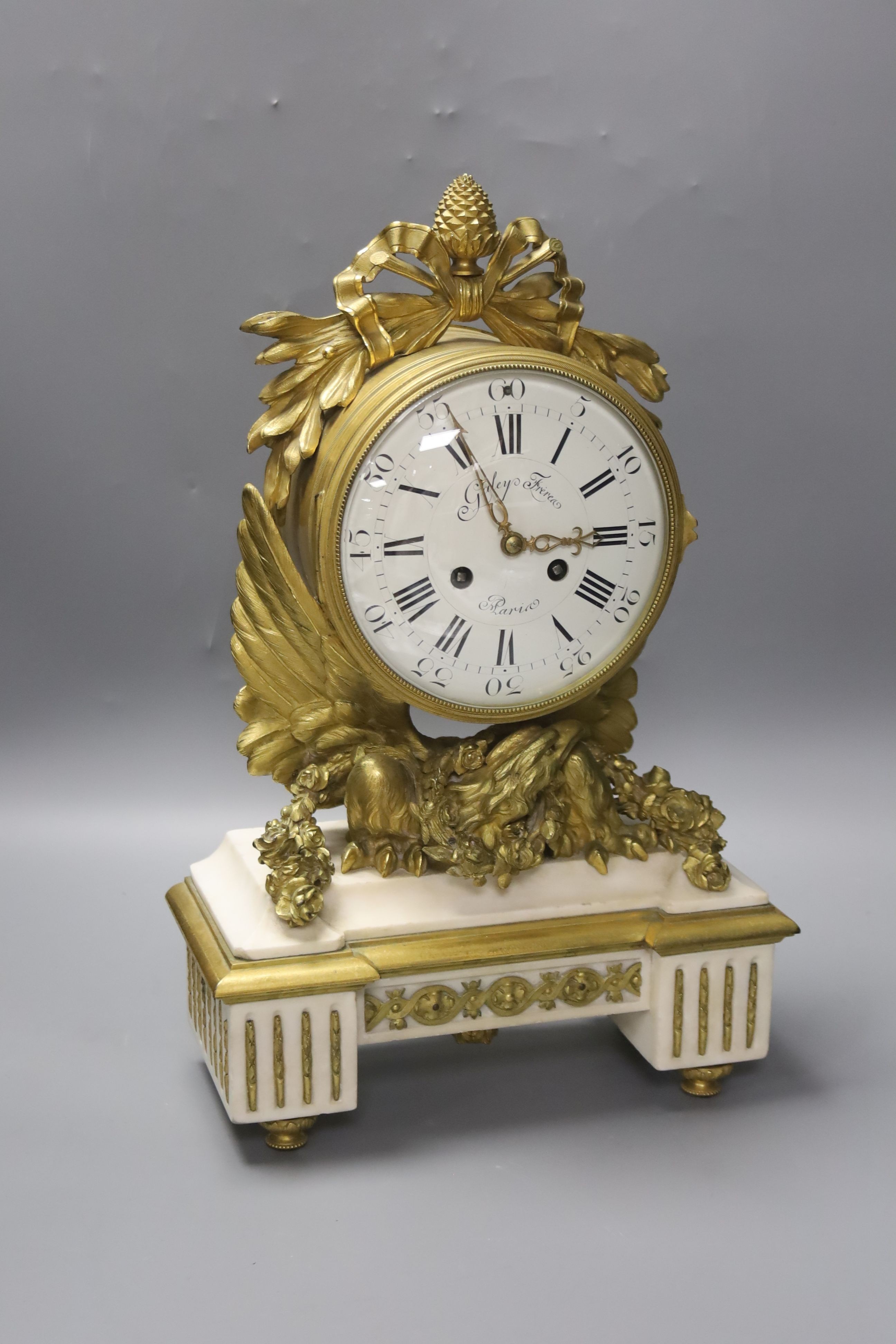 A French ormolu and white marble mantel clock, the case late 18th century, the movement late 19th century 41 cm high